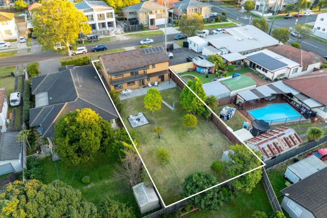 Massive Block, Peaceful Street – Develop, Invest, or Move Right In!