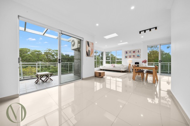 Sun-Drenched Top Floor Living in Boutique Complex of Six