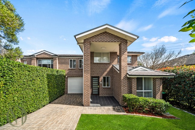 Stylishly Updated Five-Bedroom Family Home with Tree-Top Deck Retreat