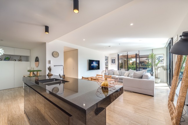 ELEGANT TERRACE LIVING IN ONE OF THE GC'S MOST FINELY CRAFTED ENCLAVES