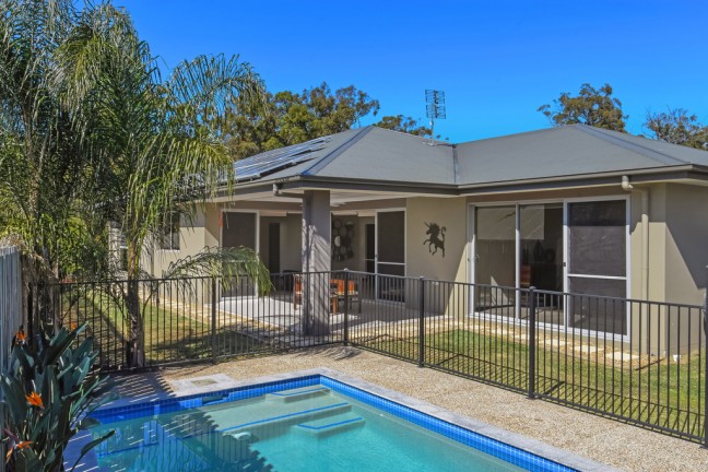 Single level four bedroom freestanding home with pool