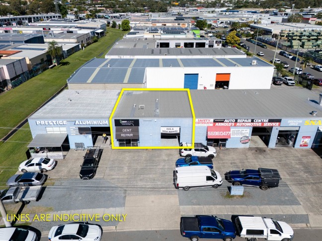 PRICED TO LEASE - HURRY  - WAREHOUSE WITH OFFICE - HIGH PROFILE STREET FRONT LOCATION!!