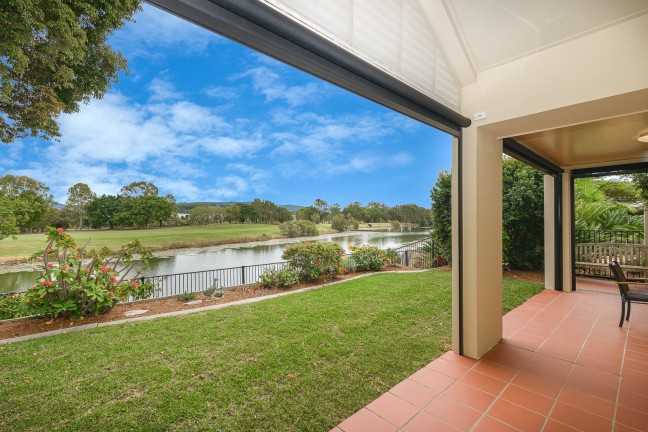 Elevated, rare single level waterfront and golf course home in EASTHILL RESIDENCES