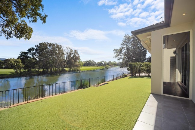 Easthill North-Golf Front Single level-offering unparalleled luxury in a prime waterfront location